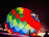 Hei&szlig;luftballonfahrt bei Nacht im Ostallg&auml;u &uuml;ber die Alpen